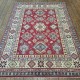 Bring timeless Caucasian artistry into your home with this hand-knotted Kazak rug (237cm x 178cm)